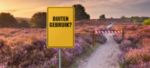 Foto van natuurgebied met bord 'Buiten gebruik?'
